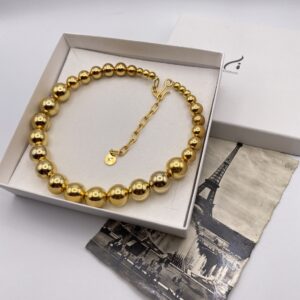 Collier Rigide avec perles dorées