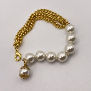 Bracelet multi chaines dorées et perles nacrées