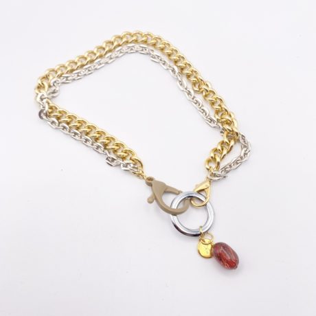 Collier multi chaines gourmettes couleur or et argent et pendant ambré 